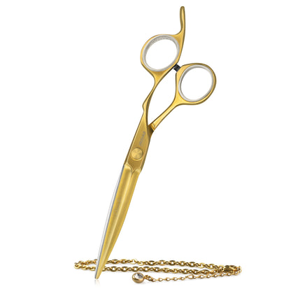 Golden hairdressing scissors with an ergonomic design.