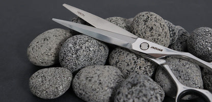 Hairdressing scissors with ergonomic design.