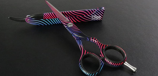 Hairdressing scissors with colorful pattern.