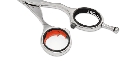 Hairdressing scissors with ergonomic design.