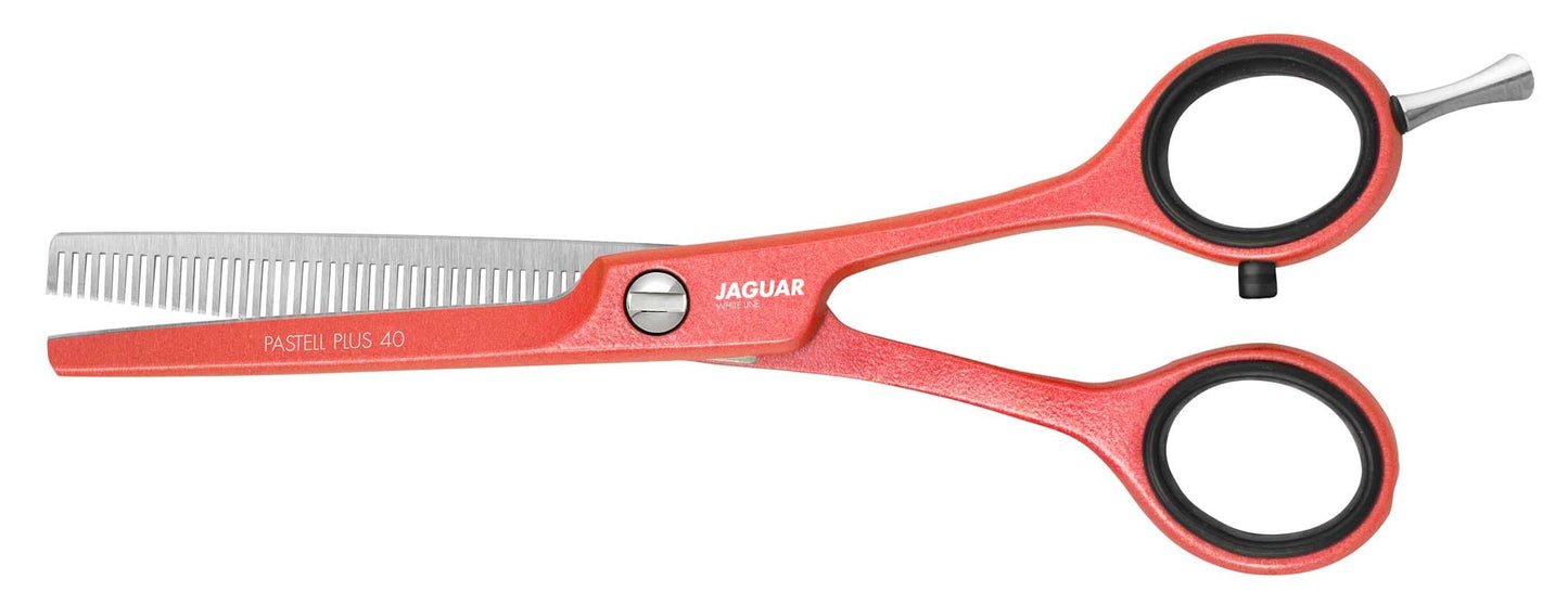 Red styling scissors for hairdressers.