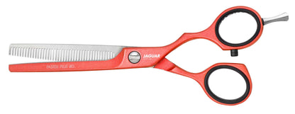Red styling scissors for hairdressers.