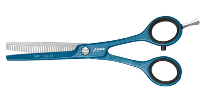 Modeling scissors with blue handle.